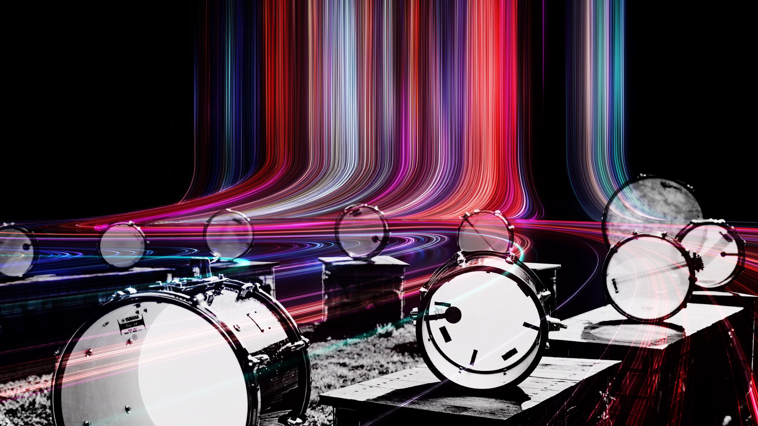 translucent drum heads float in a circle, whilst bright neon lights cascade through the centre and warp around the drums.